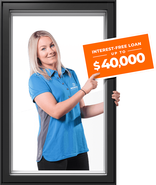 Get an interest-free Greener Homes Loan of $40,000. A Nordik sales representative in a blue shirt stands inside a RevoCell window frame, holding an orange sign that reads, Interest-free loan up to $40,000.